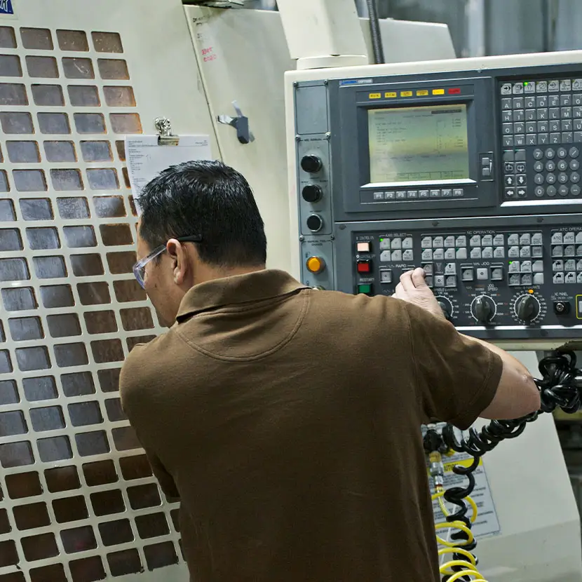 An operator of a CNC machine